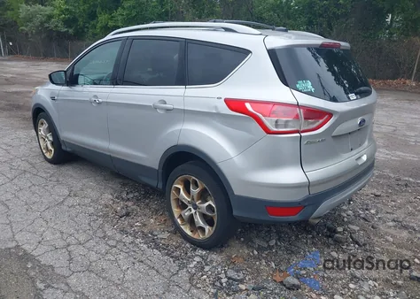 2013 Ford Escape Titanium z USA, uszkodzony, nr VIN 1FMCU9J94DUD63365